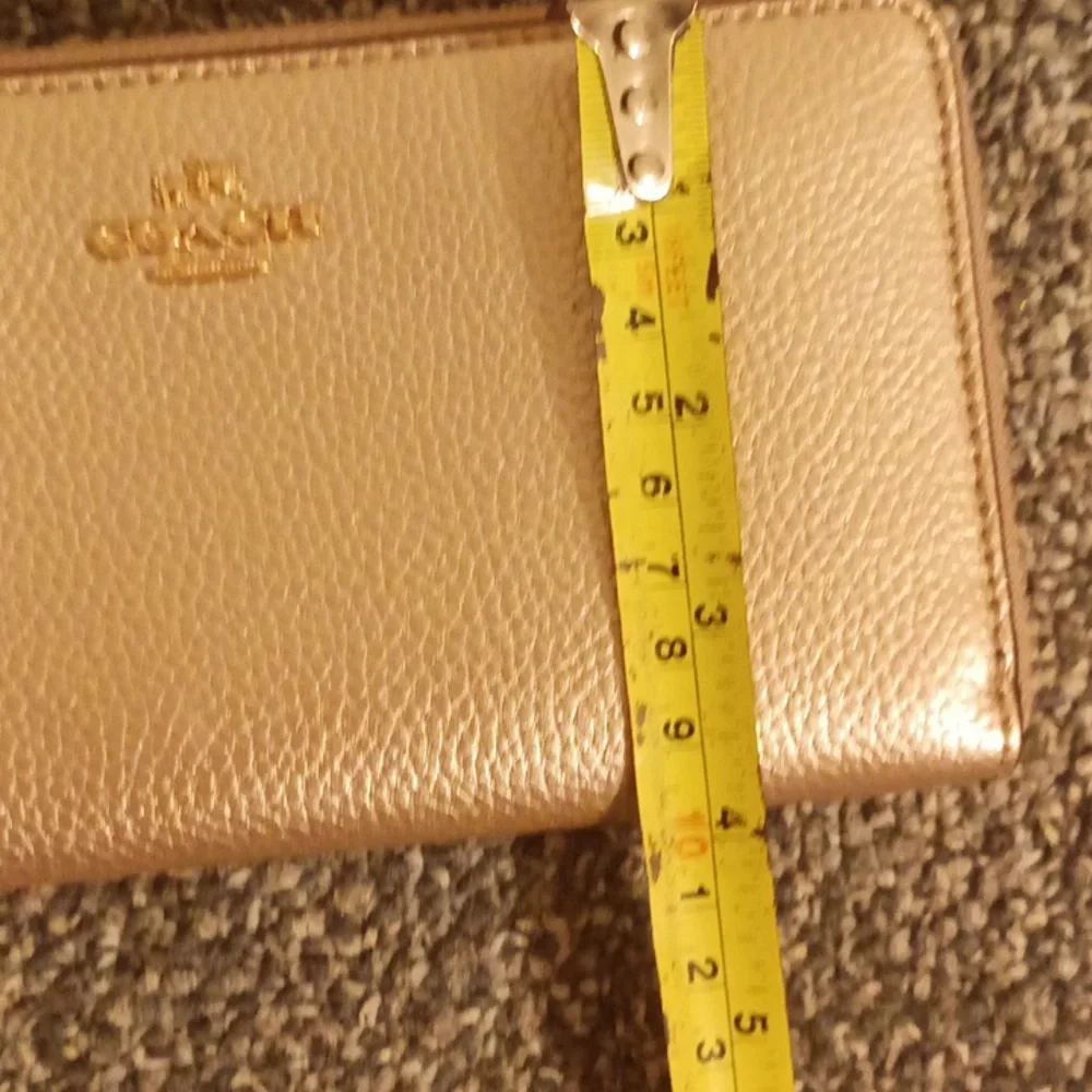 Coach gold pebbled leather accordion wallet